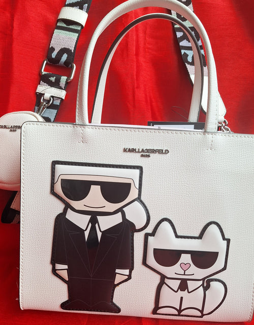 Load image into Gallery viewer, Karl Lagerfeld Crossbody Tote Bag. Top Handle, and Guitar Strap with earbud Case. Wt/W Blush.
